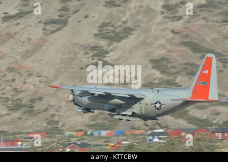 KANGERLUSSUAQ, GREENLAND -- An LC-130 Skibird takes off for Summit Camp, Greenland, on July 27, 2017. The 109th AW is currently in its fifth rotation of the Greenland season which started in April and will run through September. Four LC-130s and about 100 Airmen are deployed here from Stratton Air National Guard Base, Scotia, New York, during the current rotation. (U.S. Air National Guard photo by Senior Master Sgt. William Gizara/Released) Stock Photo