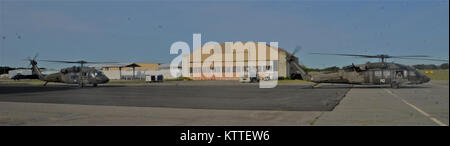 Ronkonkoma, NY - Aircrews of the New York Army National Guard’s Company B, 3rd Battalion, 142nd Aviation Regiment prepare for takeoff and deployment from Long Island MacArthur Airport, Islip, N.Y. to Florida in support of the Guard response to Hurricane Irma September 11, 2017.    Ten UH-60 Blackhawk helicopters and 55 aircrew members and maintainers deployed from three flight facilities across the state to support the Florida Army National Guard. U.S. National Guard photo by Capt. Mark Getman, New York Guard. Stock Photo