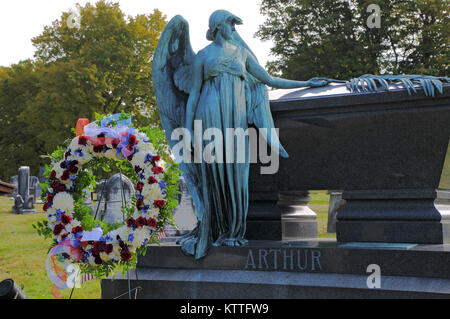 A wreath from President Donald Trump stands ready at the grave of President Chester Arthur, president from 1881 to 1885, prior to a ceremony at Albany Rural Cemetery in Menands, N.Y. recognizing the 19ith century leader on Oct. 5, 2017. The United States Military honors deceased presidents with a wreath from the sitting president at their gravesite on the anniversary of the past president's birth. ( New York State Division of Military and Naval Affairs photo by William Albrecht) Stock Photo