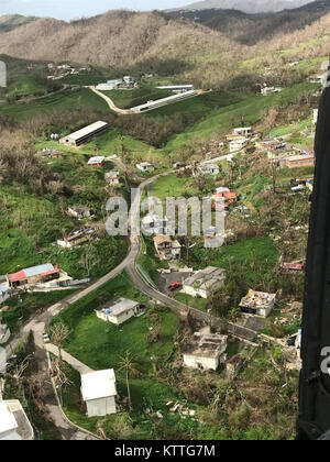 The damage from Hurricane Maria is evident in this photograph taken from aUH-60 operated by the 3rd Battalion 142nd Aviation on Oct. 18, 2017. The 3rd Battalion 142nd Aviation has deployed 60 Army National Guard Soldiers and four UH-60 Blackhawk helicopters to Puerto Rico to assist in the island's recovery from Hurricane Maria Stock Photo