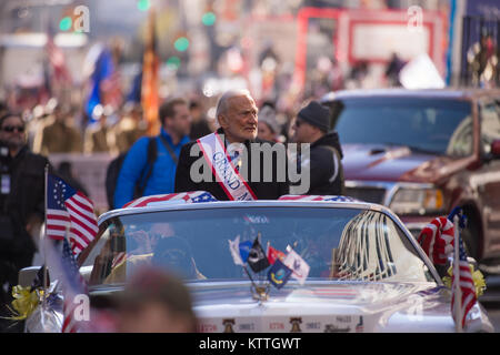 Former astronaut and Air Force pilot Buzz Aldrin serves as the Grand Marshall of the New York City Veterans Day Parade Nov. 11, 2017. This year the United States Air Force was honored as the &quot;Featured Service&quot; during the parade.  With more than 40,000 participants, the New York City Veterans Day Parade is the largest Veterans Day event in the United States.   Air National Guard Photo by Staff Sgt. Christopher S. Muncy Stock Photo