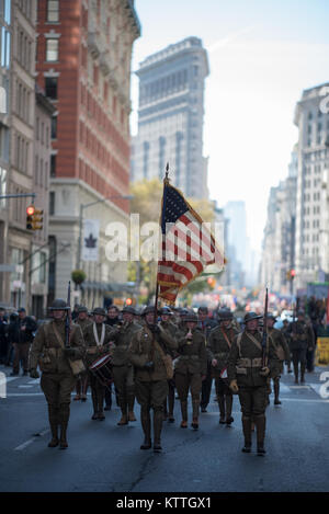 Historical reenactors representing soldiers and Marines during World War One march during the New York City Veterans Day Parade Nov. 11, 2017. This year the United States Air Force was honored as the &quot;Featured Service&quot; during the parade.  With more than 40,000 participants, the New York City Veterans Day Parade is the largest Veterans Day event in the United States.   Air National Guard Photo by Staff Sgt. Christopher S. Muncy Stock Photo