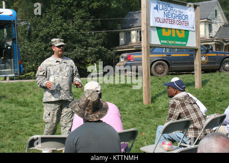 New York Army National Guard Sgt. 1st Class Frank Rizzi briefs volunteers before missions in Prattsville, N.Y. Sep. 4. Photo by Lt. Col. Richard Goldenberg, NY Army National Guard. Stock Photo