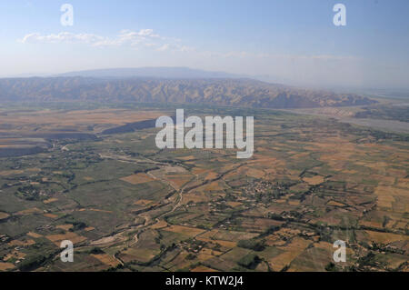 An aerial view from the window of a Blackhawk helicopter near Kunduz, Kunduz Province, Afghanistan, June 27, 2012. (37th IBCT photo by Sgt. Kimberly Lamb) (Released) Stock Photo