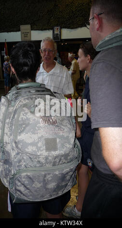 TROY, NY-- New York Army National Guard recruits enrolled in the Recruit Sustainment Program speak to John Walker, a World War II veteran of the 42nd Infantry Division during the visit of the veterans to the 42nd Infantry Division Headquarters building at Glenmore Road on Saturday, July 14. Members of the 42nd Division Veterans Memorial Foundation held their annual reunion in Albany July 13-15. Stock Photo