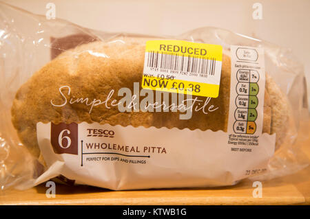 Reduced price label packet Tesco wholemeal pitta bread, UK Stock Photo