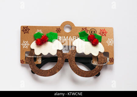 Pair of Primark novelty Christmas Pudding glasses isolated on white background Stock Photo