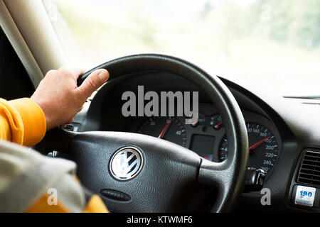 German old man driving car very fast on highway of Stuttgart go to Sandhausen district on September 3, 2017 in Stuttgart, Germany. Stock Photo