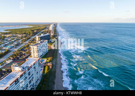 Florida Hutchinson Barrier Island,Jensen Beach,barrier island,Atlantic Ocean,water surf waves,high-rise condominium residential apartment apartments b Stock Photo