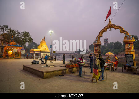 Ujjain, India - December 7, 2017:  People attending religious ceremony on holy river at Ujjain, India, sacred town for Hindu religion. Stock Photo