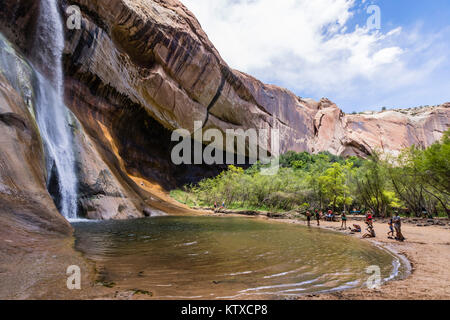 Hikers at Lower Calf Creek Falls, Grand Staircase-Escalante National Monument, Utah, United States of America, North America Stock Photo