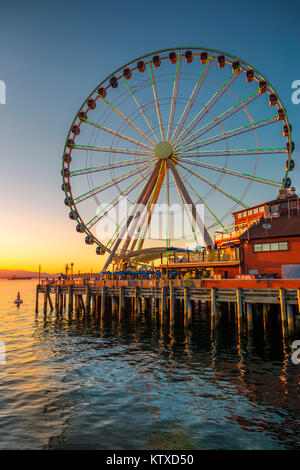 Seattle's Great Wheel on Pier 57 at golden hour, Seattle, Washington State, United States of America, North America Stock Photo