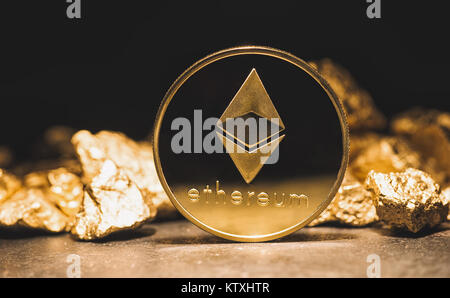 cryptocurrency Ethereum and a mound of gold nuggets - Business concept image Stock Photo