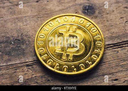 Golden Classic Bitcoin on wood Stock Photo