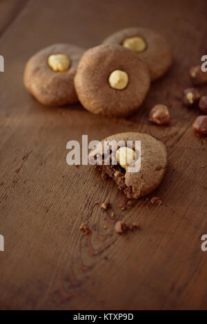 Artistic photo of home-made Hazelnut butter cookies on brown wooden table background, healthy sugar-free food desserts still ife Stock Photo