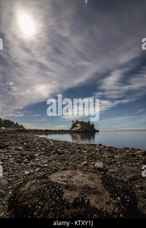 Moon above Whyte Islet in Whytecliff Park, West Vancouver, British Columbia, Canada Stock Photo