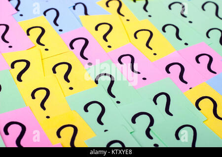 Question marks. Colorful paper notes with question marks. Concept image. Closeup. Stock Photo