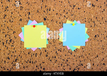 colorful sticky notes on cork bulletin board Stock Photo