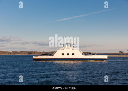 shelter island ferry making a crossing on a sunny fall day, fully loaded with vehicles Stock Photo