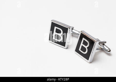 cufflinks silver on white backgrounds, close up Stock Photo