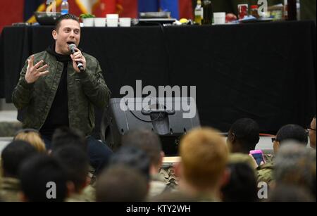 World Wrestling Entertainment (WWE) wrestler The Miz (Michael Mizanin) performs for U.S. soldiers during the USO Holiday Tour at the Bagram Airfield December 24, 2017 in Bagram, Afghanistan. Stock Photo