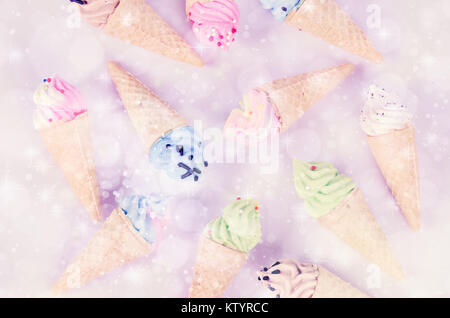 mini ice cream meringues in pastel colors, pattern abstract on pink background Stock Photo