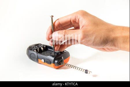 communication electrical equipment repair with hand of engineer on white or isolate background Stock Photo