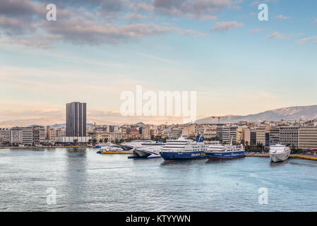 Piraeus, Greece - November 1, 2017: View on the port in Piraeus with ships and boats in the evening. Athens, Greece. Stock Photo