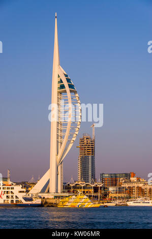 Portsmouth, England, UK - August 25, 2007: The skyline of Portsmouth, including the Spinnaker observation tower, is lit on a sunny day, as seen from a