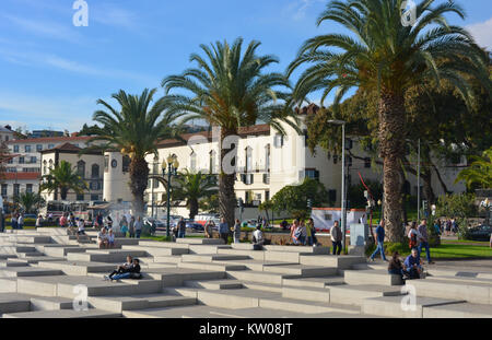 People walking on the esplanade in front of the 15th century São Lourenço Palace museum, Funchal, Madeira, Portugal Stock Photo