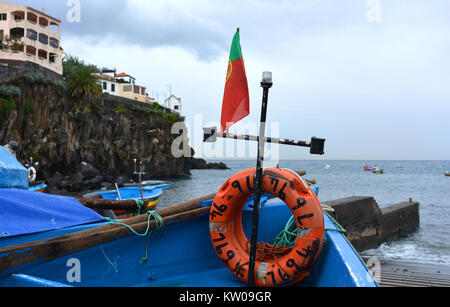 Traditional wooden fishing boat with motor in Indonesia Stock Photo - Alamy