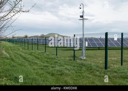 Solar panels installation in a field in Somerset, England, United Kingdom. Stock Photo