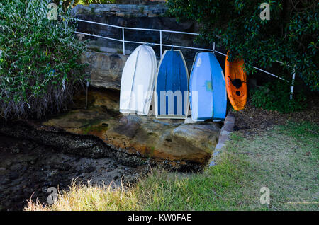 Boats Leaning Against a Rock at a seashore in Snails Bay Birchgrove ...