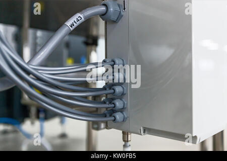 An electric meter, telephone box and cable television utility Stock