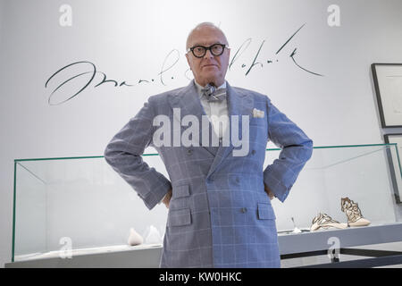 Spanish designer Manolo Blahnik poses during 'The Art of Shoe' exhibition at the National Museum of Decorative Arts in Madrid, Spain.  Featuring: Manolo Blahnik Where: Madrid, Community of Madrid, Spain When: 27 Nov 2017 Credit: Oscar Gonzalez/WENN.com Stock Photo