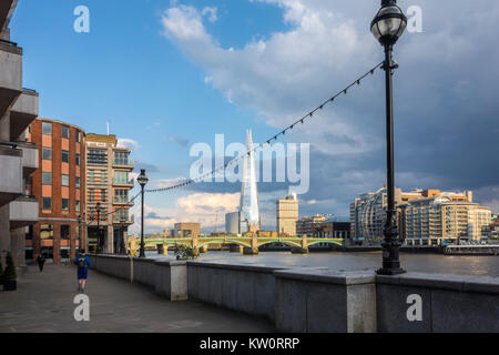 View of the River Thames, the Shard, Southwark Bridge and Southbank London skyline from Paul's Walk, Thames Path on the north bank of the Thames Stock Photo