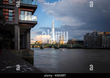 View of the River Thames, the Shard, Southwark Bridge and Southbank London skyline from Paul's Walk, Thames Path on the north bank of the Thames Stock Photo