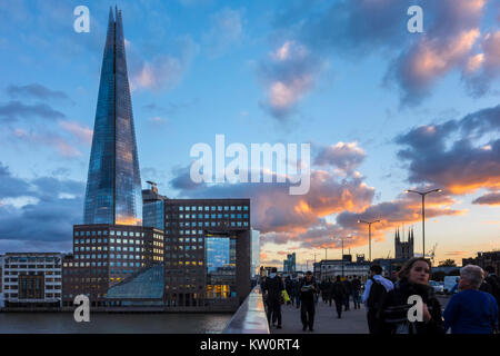 Sunset evening dusk view on London Bridge looking towards the Shard and London southbank skyline Stock Photo