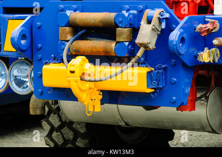 Winch on a towtruck with hook and metal cable. Stock Photo
