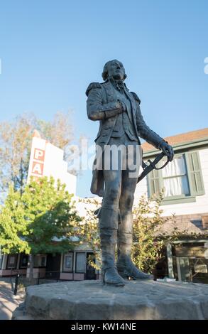 Statue of the Revolutionary War General Marquis de Lafayette in partial shadow, in downtown Lafayette, California, 2016. Stock Photo