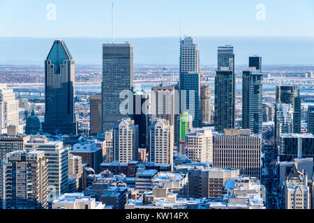 Montreal, CA - 26 December 2017: Montreal Skyline from Kondiaronk belvedere in winter after snowstorm. Stock Photo