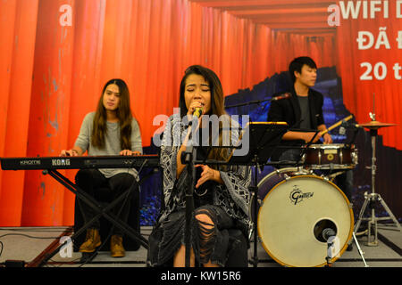 Saigon, Vietnam - Nov 20, 2017. A rock music band performs on stage of luxury restaurant in Saigon (Ho Chi Minh City), Vietnam. Stock Photo