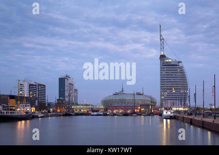 'Neuer Hafen' in Bremerhaven at the estuary of the River Weser in Northern Germany, with 'Klimahaus', Atlantic Hotel Sail City and Columbus Center Stock Photo