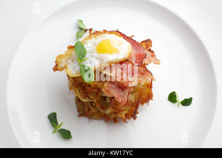 egg,ham for breakfast in white plate Stock Photo