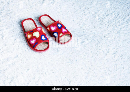 Slippers on the floor carpet. the photo with copy space for text Stock Photo