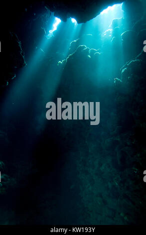 LIGHT SHINING IN UNDERWATER CAVE Stock Photo