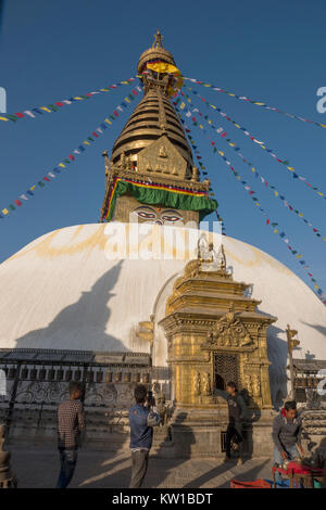 People worship at Swayambhunath temple, Kathmandu, Nepal Stock Photo