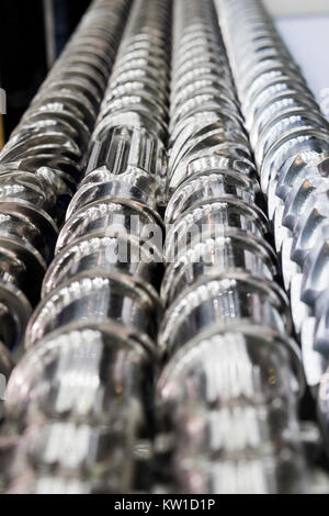 Screw Press Spare parts ; For plastic injection process Stock Photo