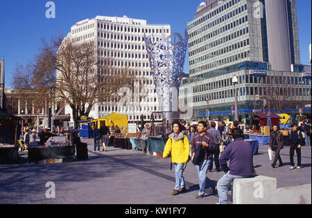 CHRISTCHURCH, NEW ZEALAND, 2008 - Asian tourists enjoying Cathedral Square in the years before the big earthquakes, Christchurch, New Zealand, circa 2008 Stock Photo