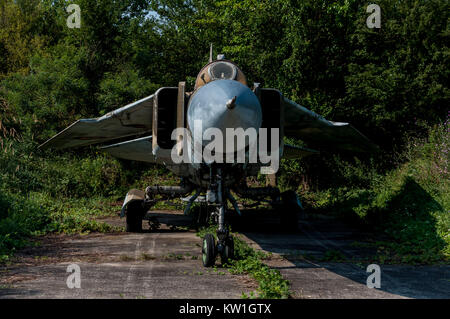 TIMISOARA, ROMANIA - JULY 20, 2013: Open doors festival. Air show at the Traian Vuia airport. Old weathered Mikoyan-Gurevich MiG-23MF Stock Photo